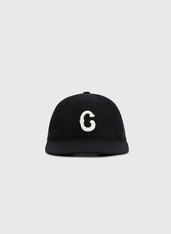 The Ebbets Field Pittsburgh Crawfords 1933 Authentic Wool Ballcap is black with a white lowercase g on the front, echoing the classic style and shown against a plain light gray background.