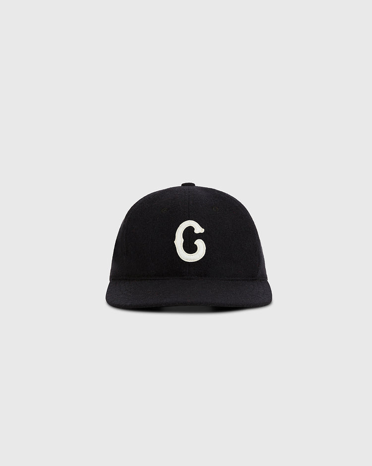 The Ebbets Field Pittsburgh Crawfords 1933 Authentic Wool Ballcap is black with a white lowercase g on the front, echoing the classic style and shown against a plain light gray background.