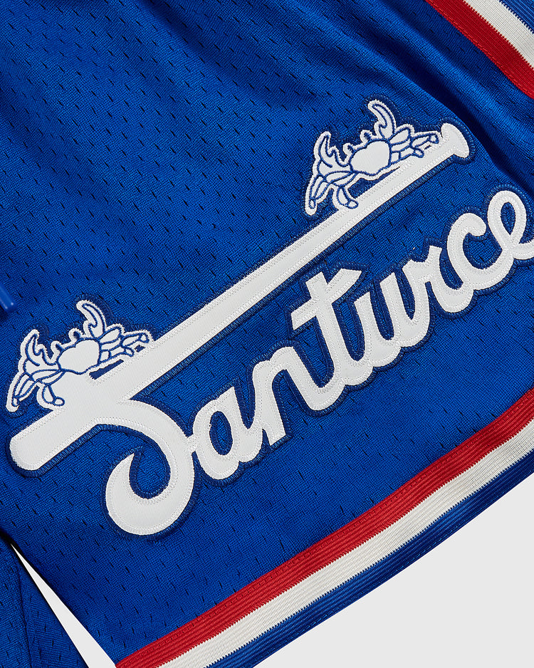 The Santurce Cangrejeros Mesh Shorts by Ebbets Field feature blue mesh, 