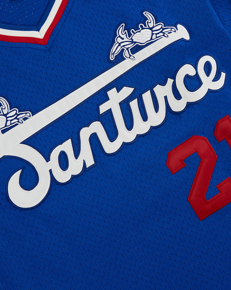 Close-up of the Santurce Cangrejeros Mesh V-Neck Jersey by Ebbets Field, featuring 