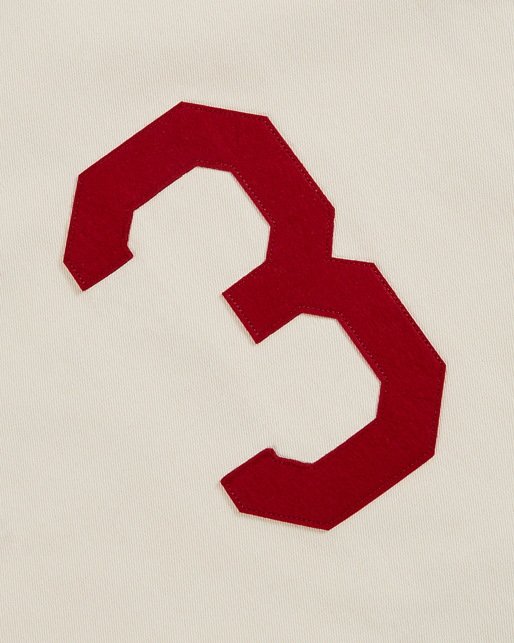A bold red number 3 is sewn onto a light beige cotton twill background, inspired by the vintage Ebbets Field Pittsburgh Crawfords 1933 Jersey.