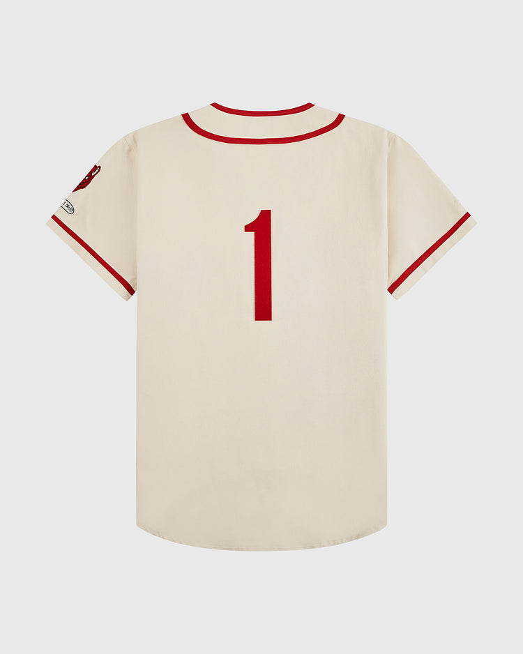 The Ebbets Field Diablos Rojos del Mexico Cotton Twill Baseball Jersey features a cream color, red trim on sleeves and collar, and a bold red number 1 on the back—a classic tribute to Mexican baseball style.