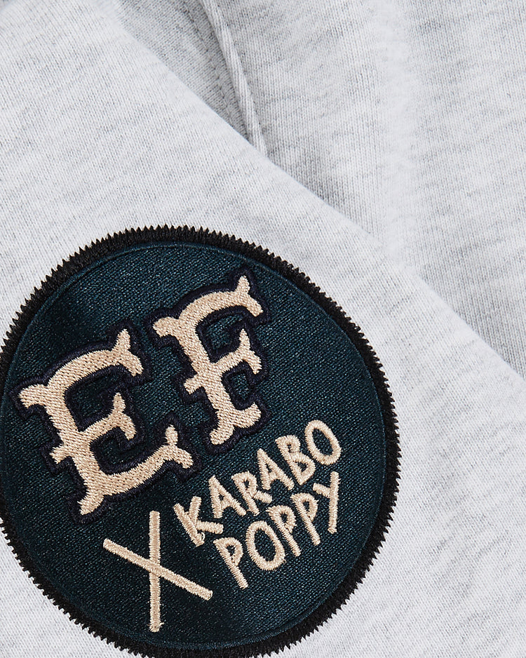 A close-up of a round, embroidered patch reading 
