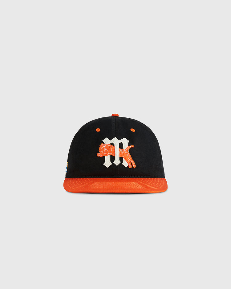 The Ebbets Field Marianao Tigres Cotton Twill Ballcap features a black crown, orange brim, white M, and orange tiger patch—ideal for fans of the classic Cuban League team.