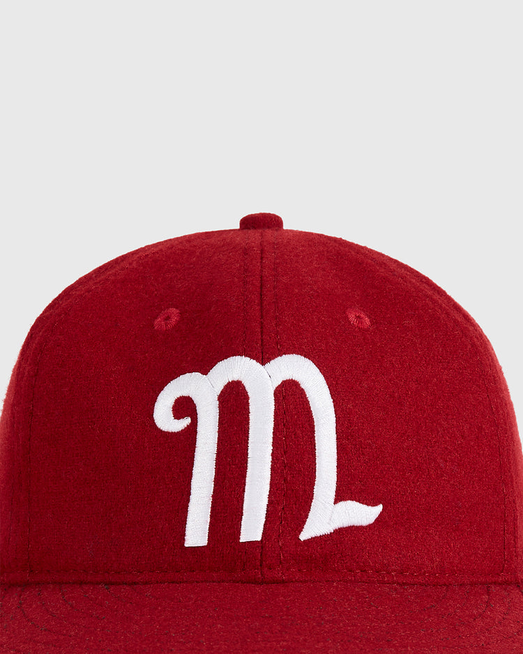The Ebbets Field Mexico City Diablos Rojos 1957 Authentic Wool Ballcap in red features a white Scorpio zodiac symbol on the front, displayed against a plain light gray background.