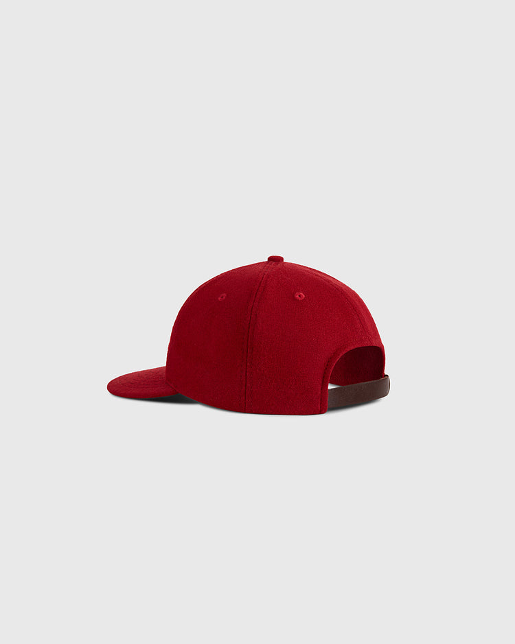 The Ebbets Field Mexico City Diablos Rojos 1957 Authentic Wool Ballcap is shown in red, viewed from the back and side to display its curved brim and adjustable strap against a plain light gray background.