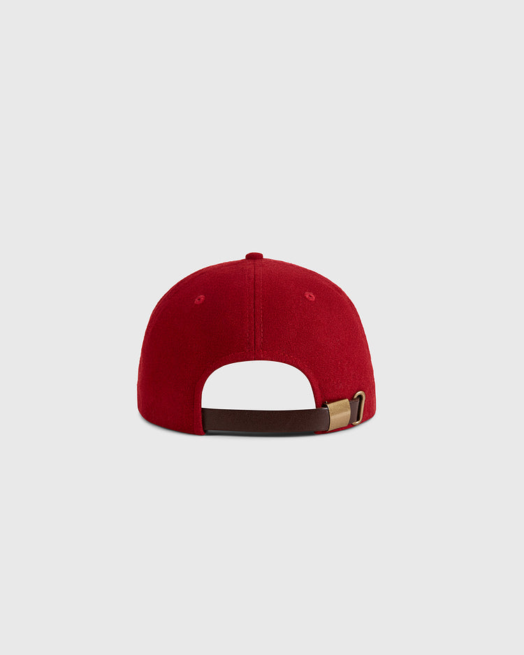 The Ebbets Field Habana Leones Cuba 1940 Authentic Wool Ballcap is shown from the back in red, featuring a brown adjustable strap with gold buckle, set against a plain light gray background.