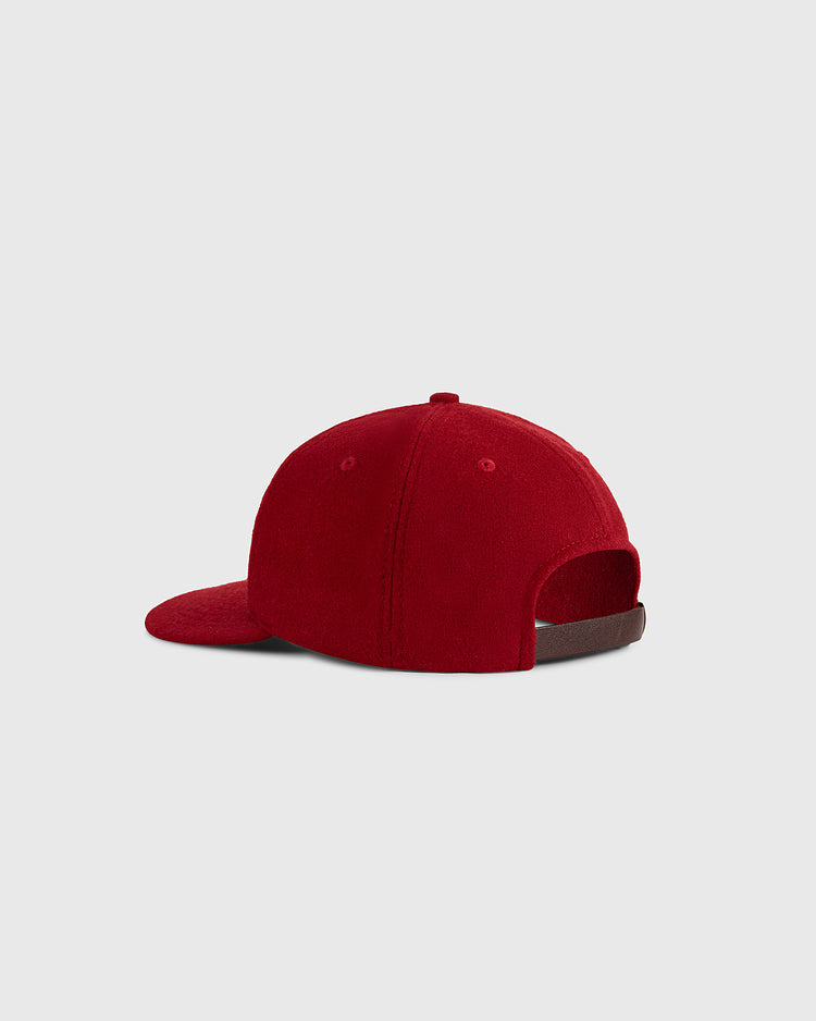 The Habana Leones Cuba 1940 Authentic Wool Ballcap by Ebbets Field is shown in red from the back on a light gray background, featuring a curved brim and adjustable strap closure.