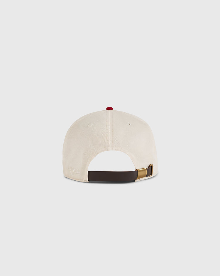 The Ebbets Field Diablos Rojos del Mexico cotton twill ballcap is shown from the back, with a brown adjustable strap, brass buckle, and red top button, set against a plain white background.