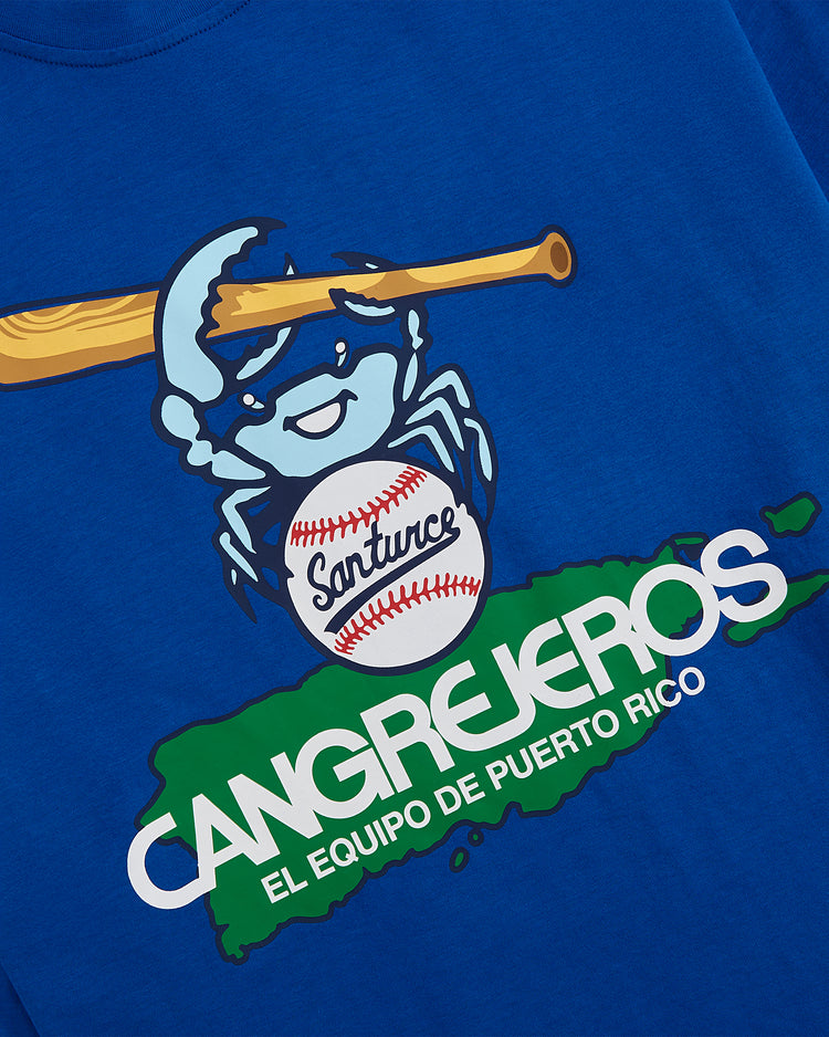 A blue cartoon crab with a bat and Santurce baseball sits above 
