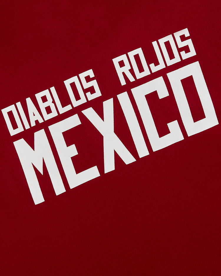 Show your team pride with the Diablos Rojos del Mexico Short Sleeve Graphic Tee by Ebbets Field—classic vintage style with bold white DIABLOS ROJOS MEXICO text. Perfect for fans of this iconic Liga Mexicana de Beisbol team.
