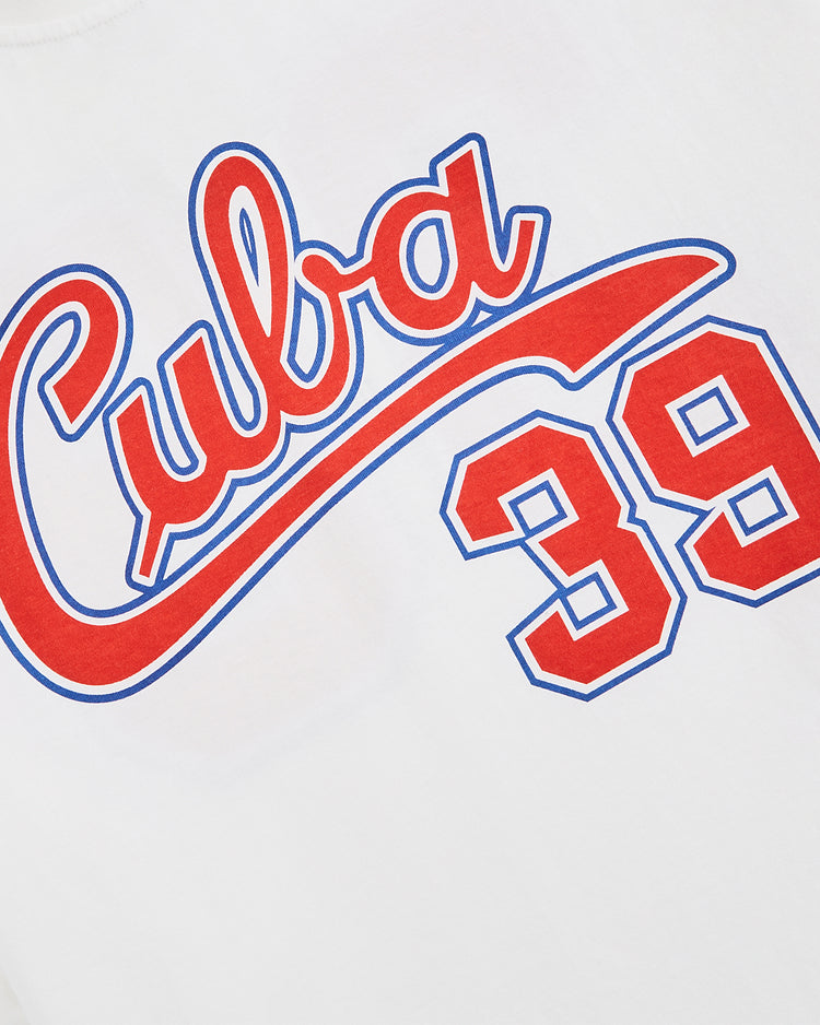 The Cuba National Team Short Sleeve Graphic Tee by Ebbets Field features “Cuba” in bold red script with a blue outline and the number 39 below, celebrating the Cuban baseball team’s classic style.