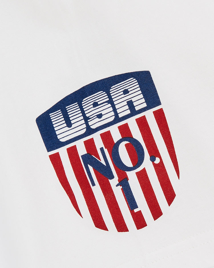 The Ebbets Field USA Short Sleeve Graphic Tee features a shield logo with blue 