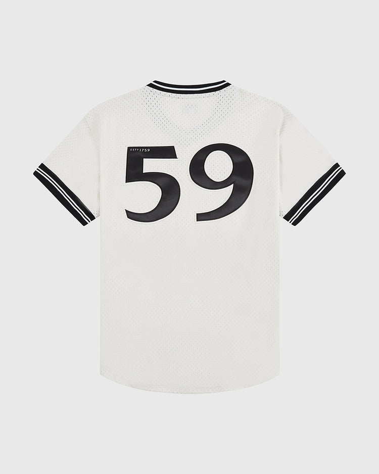 The Ebbets Field Guinness Seal Mesh V-Neck Jersey is a white short-sleeve sports top with black collar and cuff stripes, and features the number 59 in bold black print on the back.