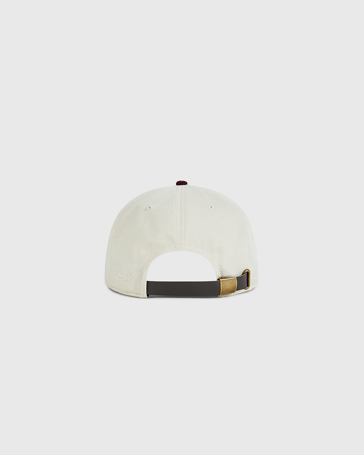 Back view of the Ebbets Field Texas A&M University 1952 cotton twill ballcap in cream, featuring an adjustable dark strap and brass buckle, shown against a plain white background.