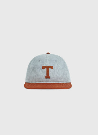 The Ebbets Field University of Texas 1943 Cotton Twill Ballcap features a gray crown, brown brim, and large brown T, inspired by the historic Longhorns team. Displayed on a plain white background.