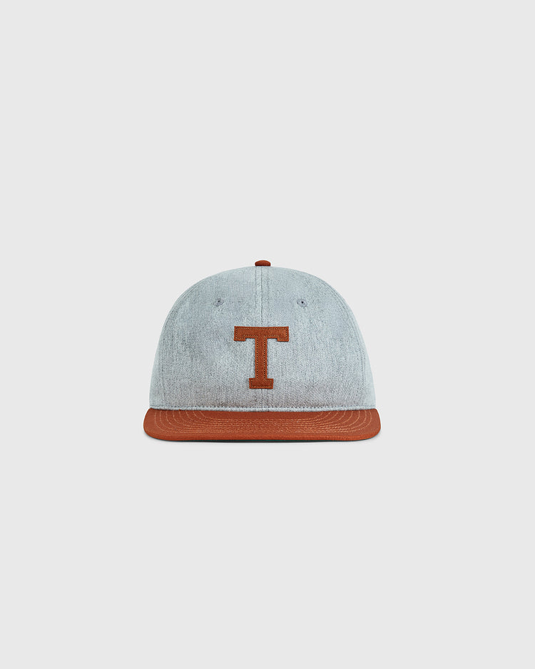 The Ebbets Field University of Texas 1943 Cotton Twill Ballcap features a gray crown, brown brim, and large brown T, inspired by the historic Longhorns team. Displayed on a plain white background.