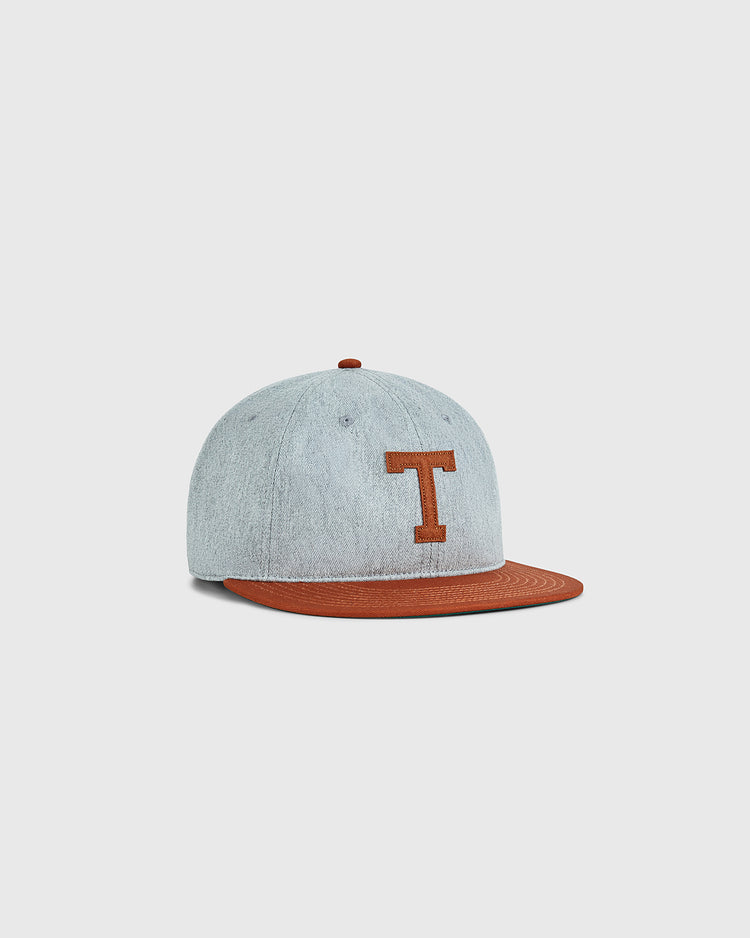 The Ebbets Field University of Texas 1943 Cotton Twill Ballcap features light gray fabric, a brown brim, and a large brown T on the front, inspired by the 1943 Longhorns and shown against a white background.