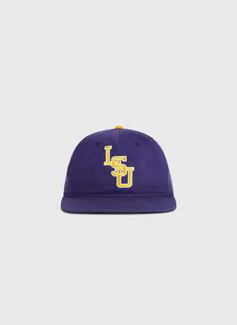 The Ebbets Field Louisiana State University 1987 Cotton Twill Ballcap features “LSU” embroidered in yellow and white on the front of a purple cotton twill cap, shown against a plain light gray background.