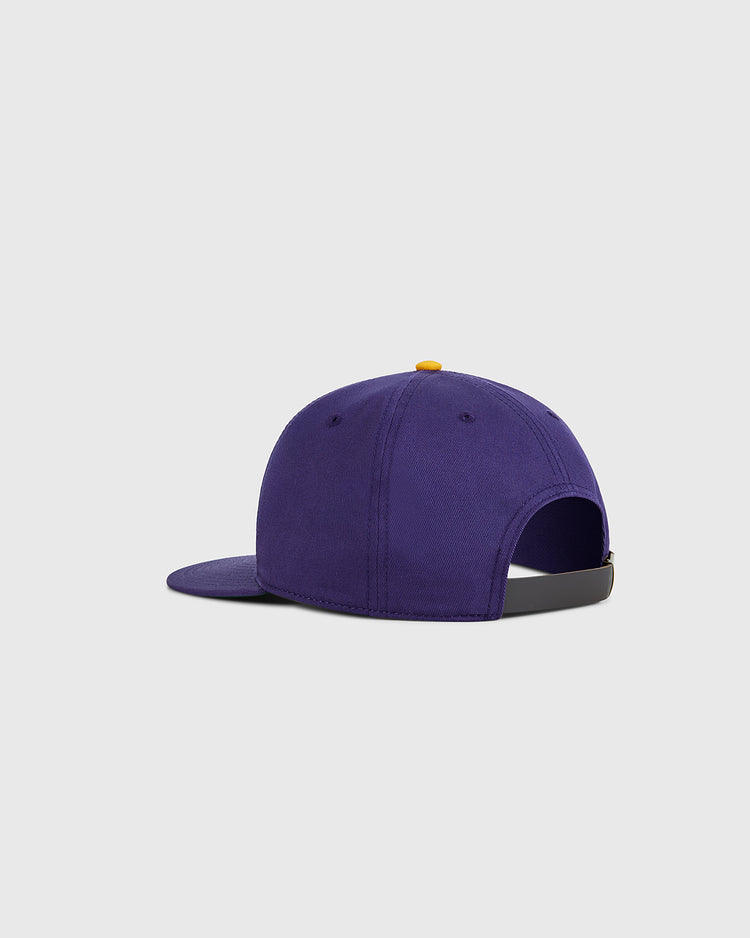 The Louisiana State University 1987 Cotton Twill Ballcap by Ebbets Field is shown from the back, with a black adjustable strap and yellow top button, made of cotton twill, set against a plain light gray background.