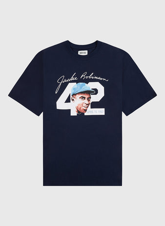 The Ebbets Field Jackie Robinson Water Color Short Sleeve Graphic Tee features a navy blue design with a portrait, the number 42, and the April 15, 1947 date on the front.