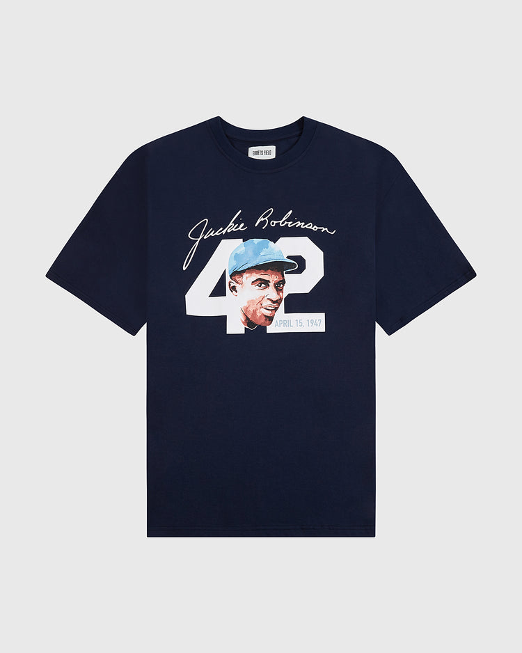 The Ebbets Field Jackie Robinson Water Color Short Sleeve Graphic Tee features a navy blue design with a portrait, the number 42, and the April 15, 1947 date on the front.