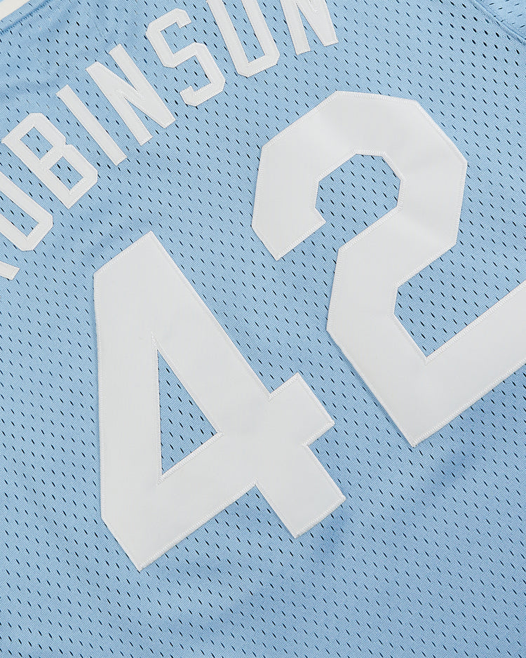 Close-up of the Ebbets Field Jackie Robinson Powder Blue V-Neck Mesh Jersey, featuring white mesh details, 