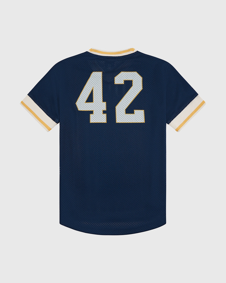 The Ebbets Field University of Notre Dame V-Neck Mesh Jersey features navy blue mesh with white and yellow trim and a bold white number 42 on the back—ideal for fans of classic Irish collegiate style.