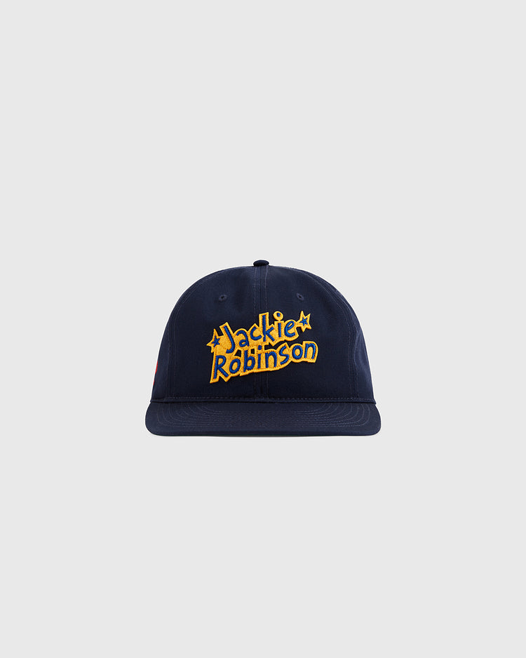The Jackie Robinson Comic Book Hero Cotton Twill Ballcap by Ebbets Field features navy blue cotton twill, yellow 
