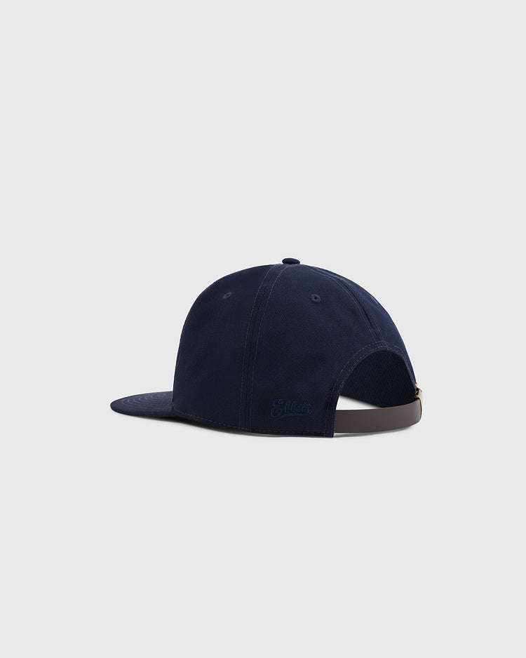 The Ebbets Field Jackie Robinson Comic Book Hero Cotton Twill Ballcap is shown from the back with a curved brim, ventilation eyelets, and an adjustable strap with metal buckle, set against a plain light gray background.