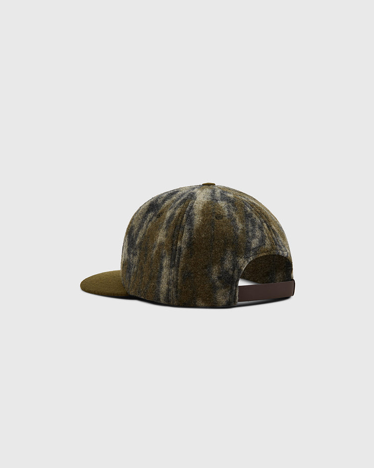 The Ebbets Field Mossy Oak x Ebbets Field 1945 Kansas City Monarchs Ballcap features a green and gray marbled Mossy Oak Bottomland pattern, curved brim, adjustable brown back strap, shown from the back and side on a plain gray background.