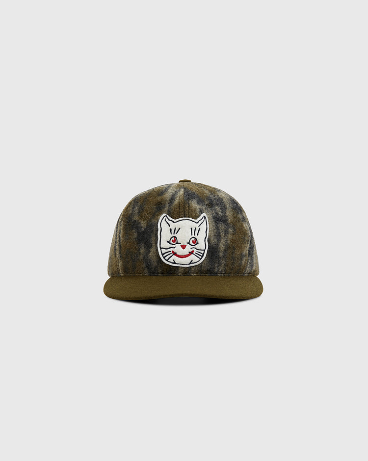 The Ebbets Field Mossy Oak x 1961 Kansas City Katz Ballcap features Mossy Oak Bottomland camo and an embroidered white cat face with red eyes and mouth, set against a plain light gray background.