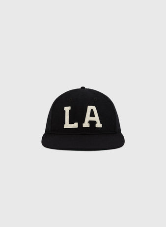 The EFF Los Angeles (PCL) 1949 Authentic Wool Ballcap in black features large white embroidered LA letters on the front and is shown against a plain light gray background.