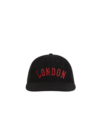 The Ebbets Field London City Series Wool Ballcap is made from genuine black wool broadcloth, featuring bold red 
