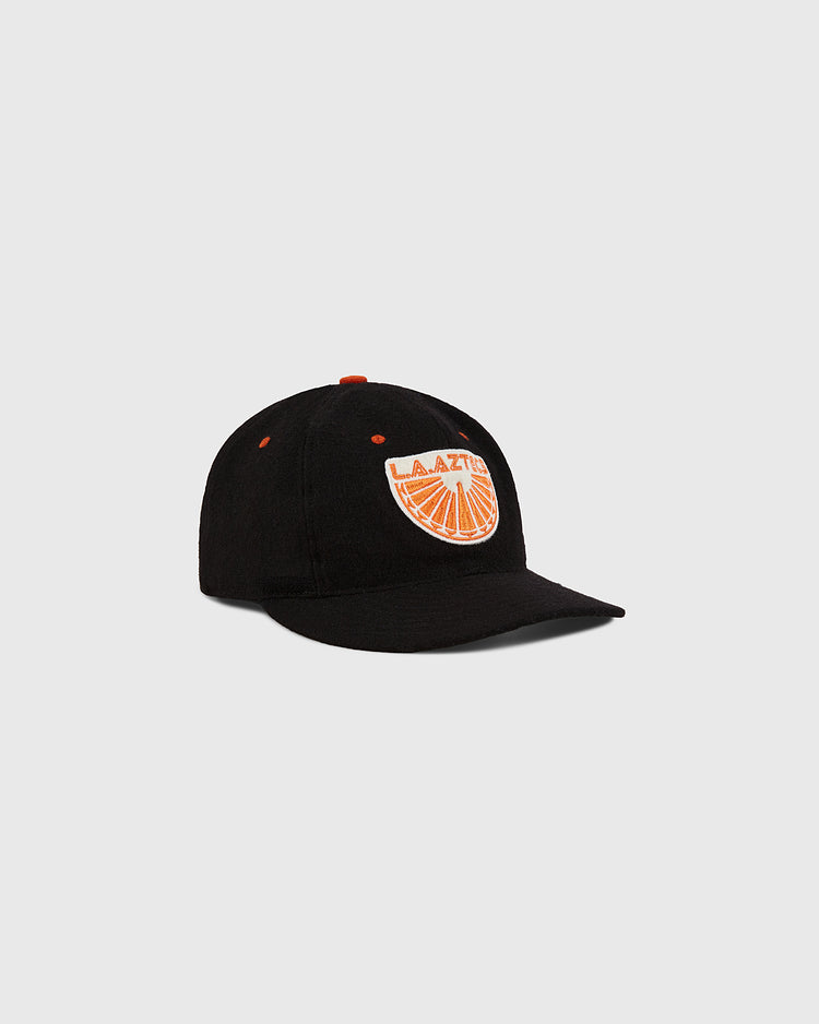 The Los Angeles Aztecs Wool Ballcap by Ebbets Field is a black cap with an orange and white 