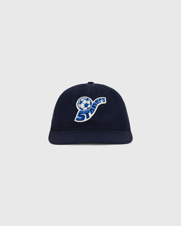 The Pennsylvania Stoners Cotton Twill Ballcap by Ebbets Field features a soccer ball graphic and “Sockers” embroidered in blue and white on the front, shown against a light gray background.