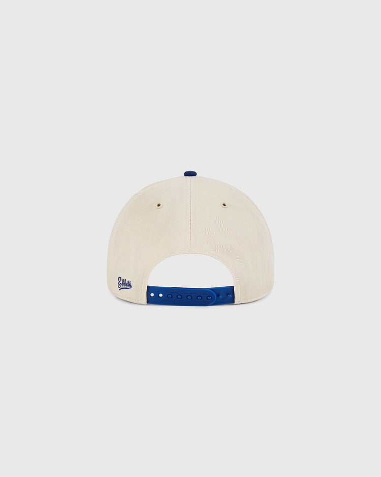 The Ebbets Field Pennsylvania Stoners A-Frame Cotton Twill Ballcap is shown from the back, displaying its blue adjustable snapback and a small embroidered logo on the lower left, against a plain white background.
