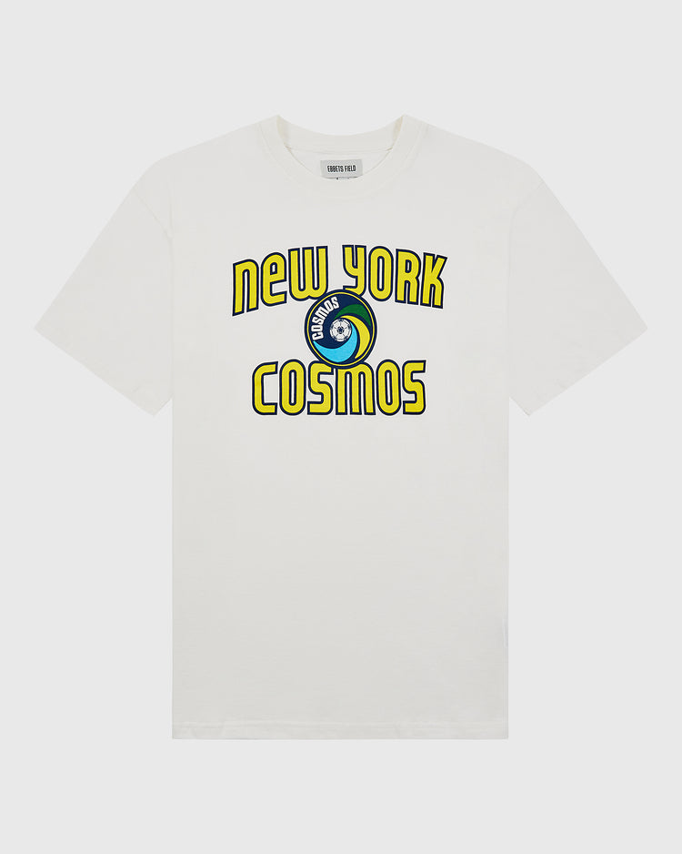 The Ebbets Field New York Cosmos Short Sleeve Graphic T-Shirt features a vibrant circular team logo and bold yellow text—an essential vintage soccer tee for any fan.
