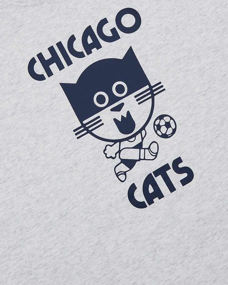 The Ebbets Field Chicago Cats Short Sleeve Graphic T-Shirt features a vintage-inspired cartoon cat playing soccer with bold CHICAGO CATS text, printed on light gray fabric—perfect for fans of the American Soccer League.