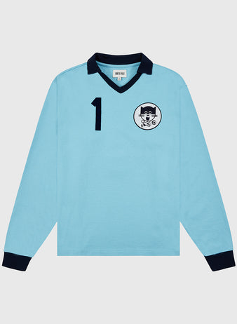 The Ebbets Field Chicago Cats Vintage Soccer Goalie Jersey features a light blue body, dark blue collar and cuffs, a large number 1 on the left chest, and a cartoon cat logo in a white circle.