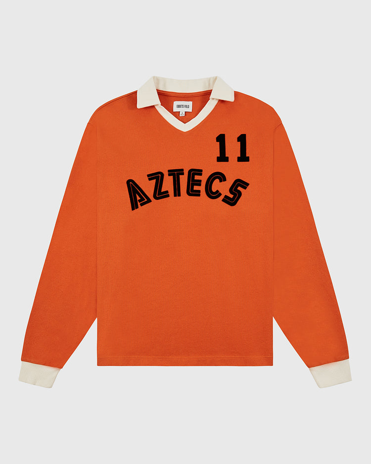 The Ebbets Field Los Angeles Aztecs Vintage Soccer Goalie Jersey features orange long sleeves, cream cuffs and collar, plus 
