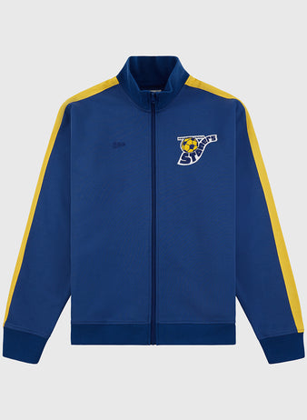 The Ebbets Field Pennsylvania Stoners Soccer Warm Up Jacket is blue with yellow sleeve stripes, a full front zipper, and features the team logo with 
