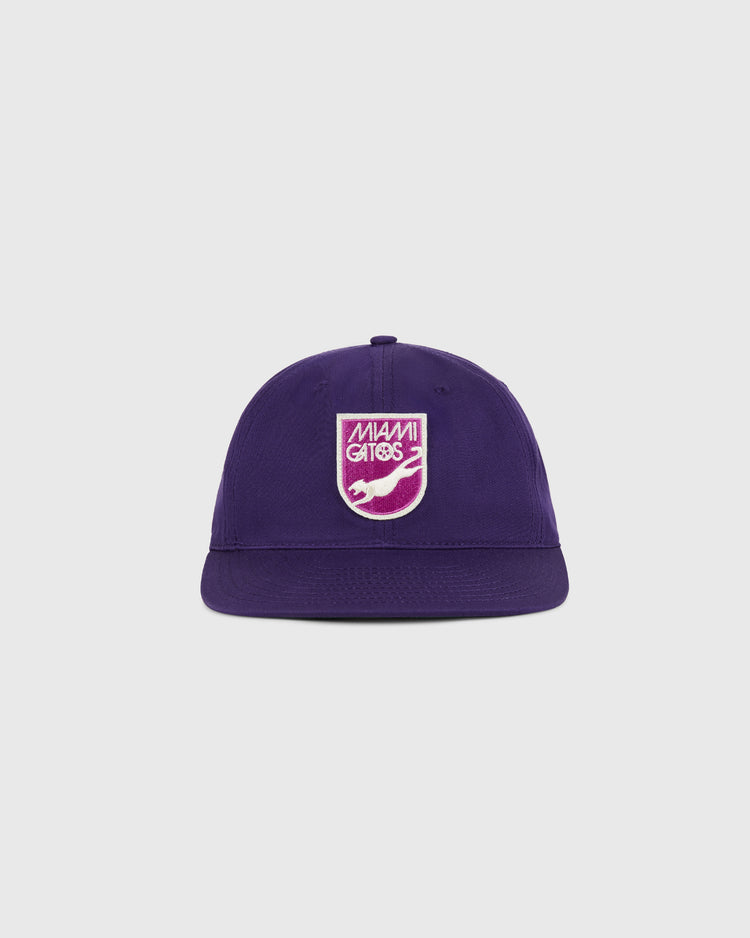 The Ebbets Field Miami Gatos Cotton Twill Ballcap is a purple hat featuring a pink and white 