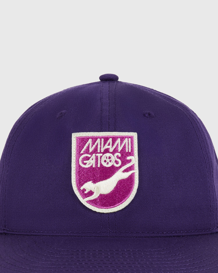A close-up of the Ebbets Field Miami Gatos Cotton Twill Ballcap, showcasing a patch with 