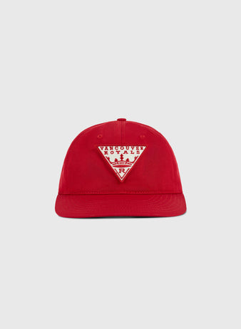 The Ebbets Field Vancouver Royals Cotton Twill Ballcap is red with a front triangular patch displaying “Vancouver Royals,” a skyline graphic, and a small VR logo.