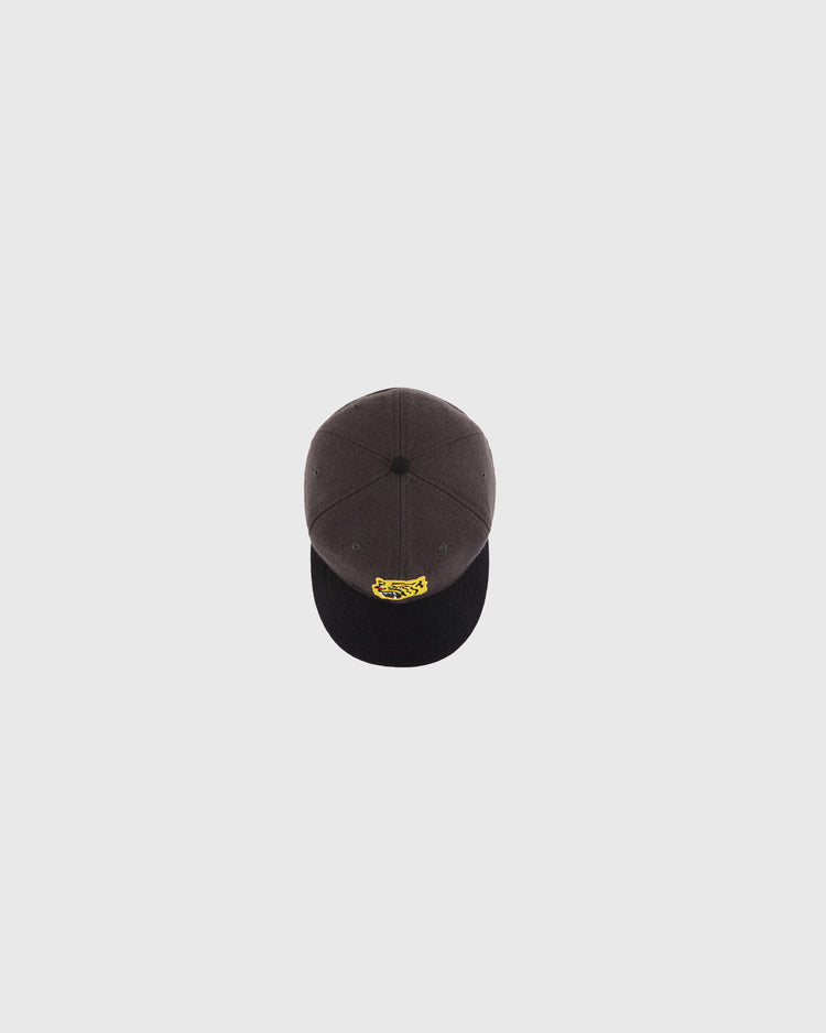 A black and dark gray Ebbets Field Osaka Tigers 1940 Wool Ballcap in youth size is shown from above, centered on a plain light gray background.