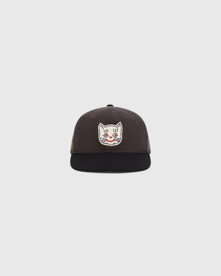 The Ebbets Field Kansas City Katz 1961 Wool Ballcap - Youth Size features a dark crown, black brim, and an embroidered white cat face with red and yellow details on the front, displayed against a plain light background.