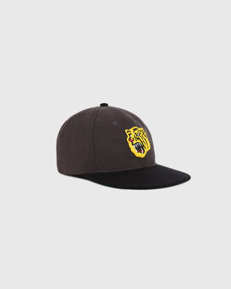 The Ebbets Field Osaka Tigers 1940 Wool Ballcap is a black Japanese baseball hat with a yellow and black embroidered roaring tiger face logo, displayed on a plain light background.