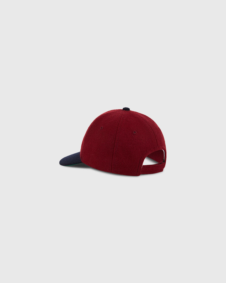 The Ebbets Field Red Reddy K 1940 Authentic Ballcap features a maroon body and navy brim, displayed from the back on a light gray background, showing its open adjustable strap.