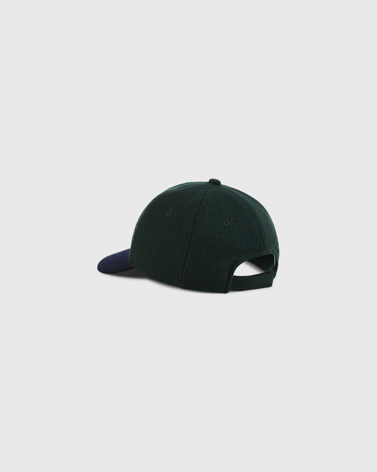 The Ebbets Field Los Angeles Angels (PCL) 1949 Youth Wool Ballcap is dark green with a navy blue curved brim, an adjustable strap, and a button on top, shown from the back against a plain white background.